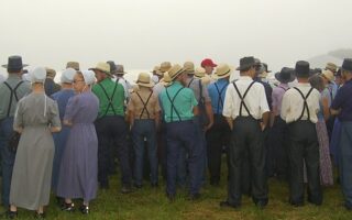 Why do Amish wear prayer caps?